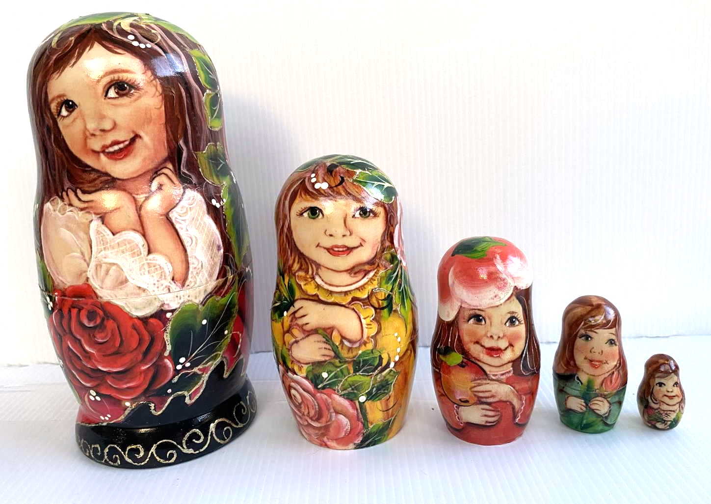 Artists Matryoshka woman clasping hands