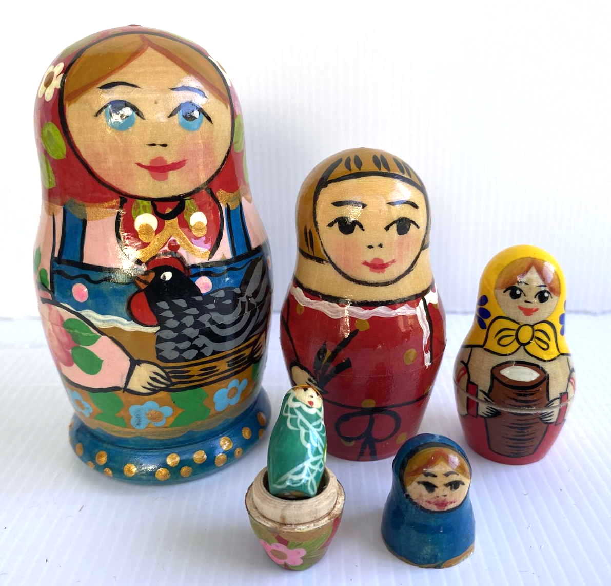 Artists Matryoshka - peasant woman with chicken
