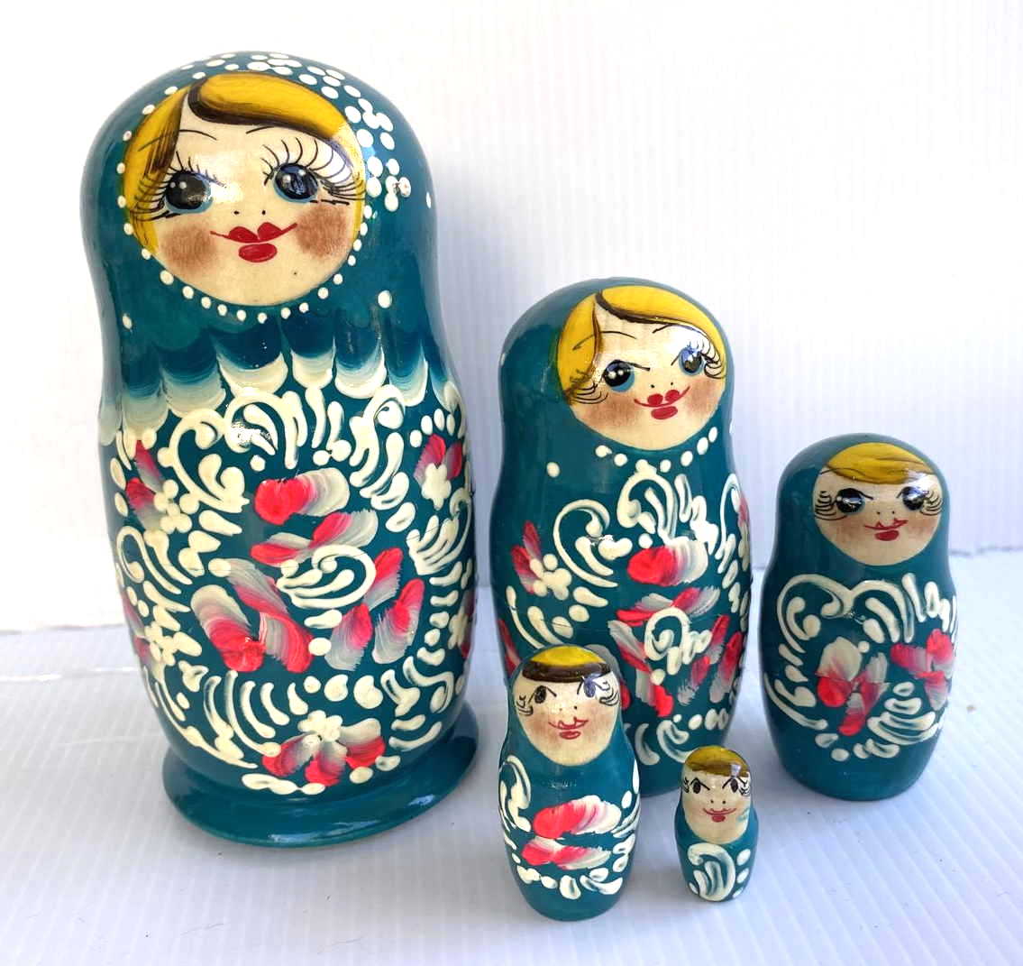 Green matryoshka with flowers