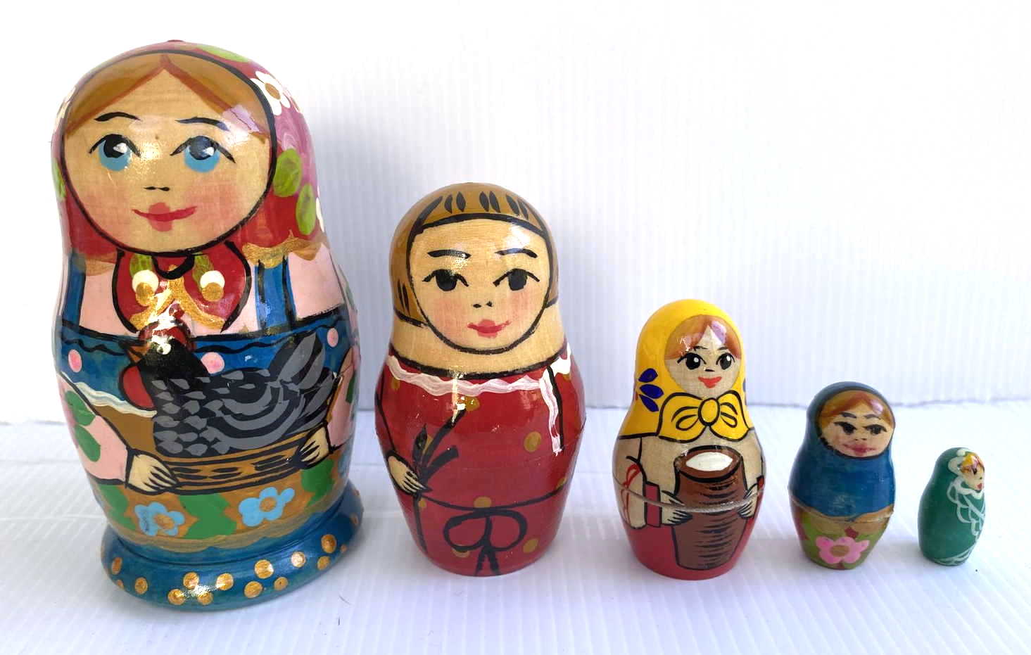 Artists Matryoshka - peasant woman with chicken