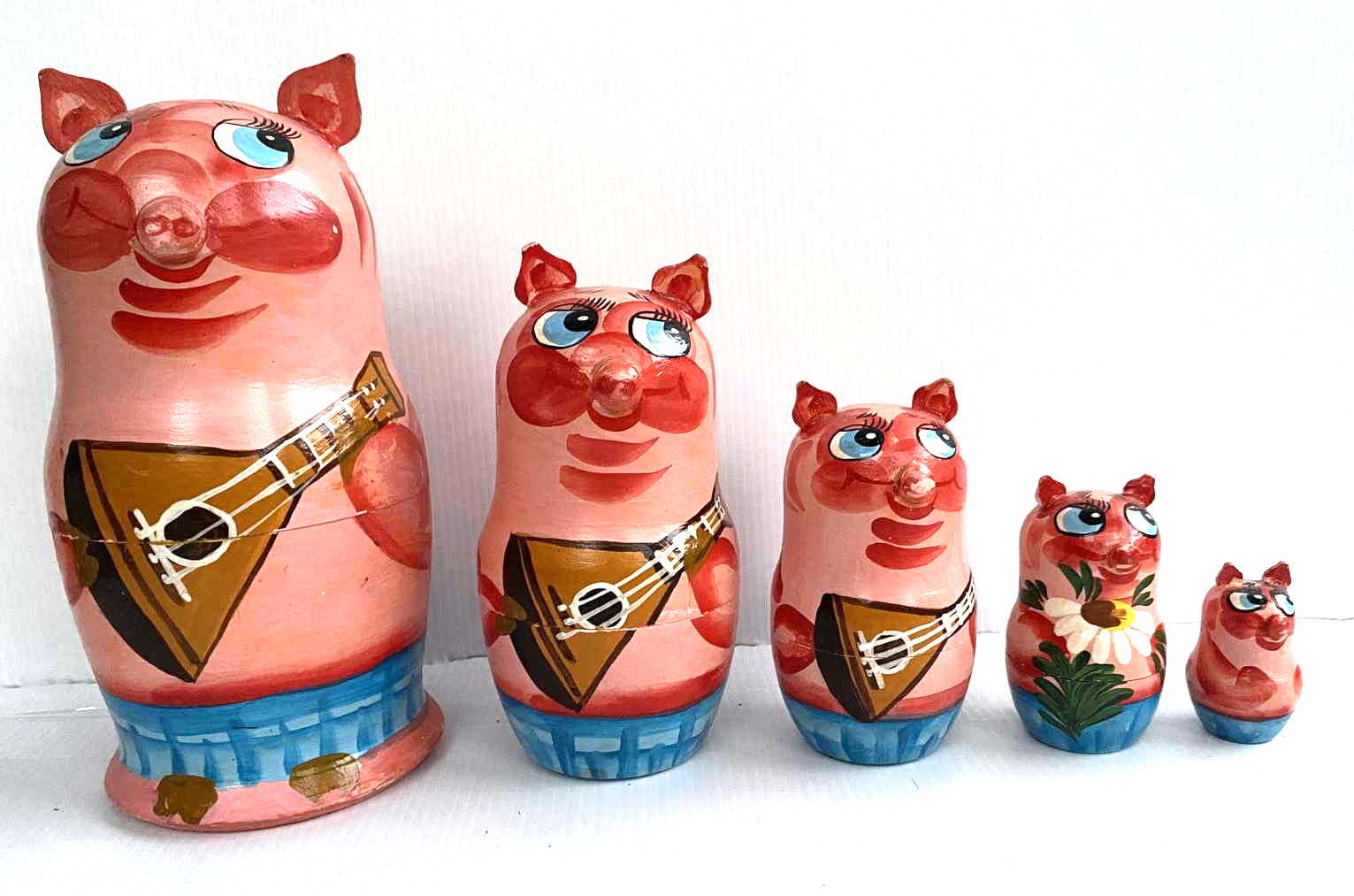Artists Matryoshka by Semenov Zhanna Pig with balalaika