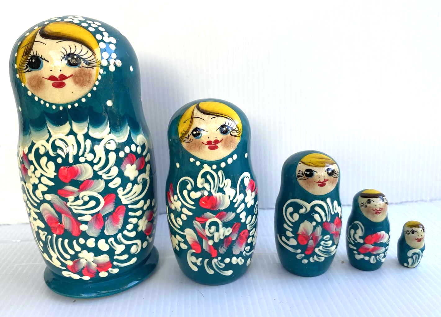 Green matryoshka with flowers
