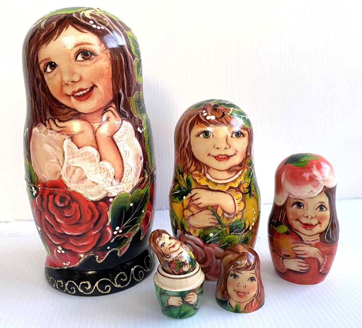 Artists Matryoshka woman clasping hands